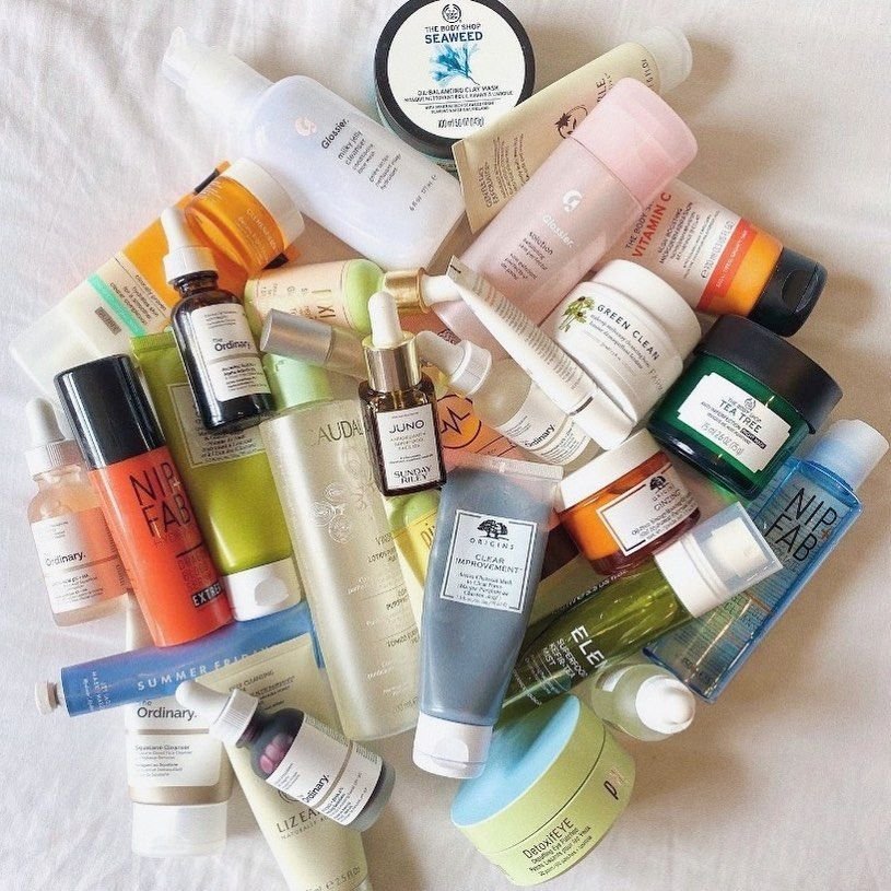 too many skincare products cluttered together showing overcomplicated skincare routine